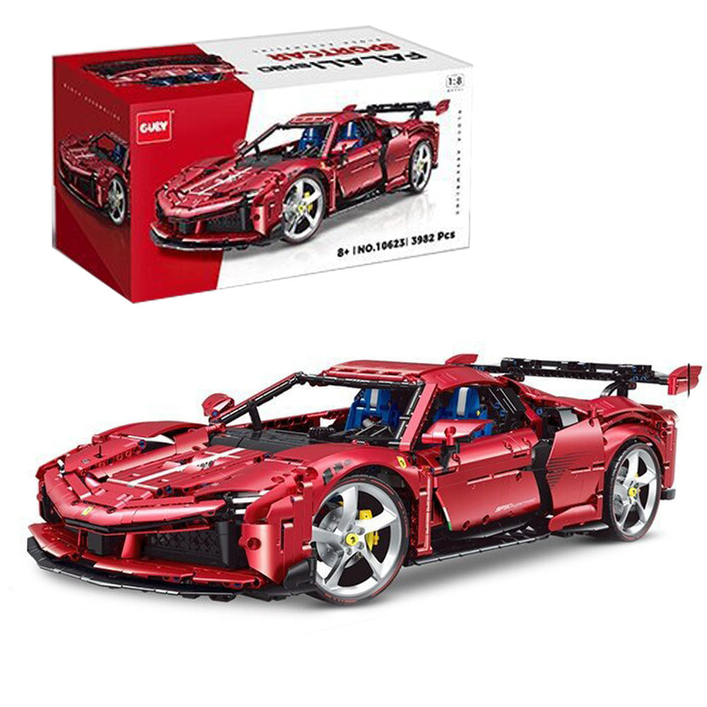 A red building-block toy sports car shown in front of its retail box on a white background. The box features the brand name GUY and an image of the assembled car.