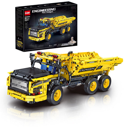 A yellow and black building block toy dump truck shown next to its retail box on a clean white background. The box features the brand name 'CUK' and the title 'ENGINEERING MULTITRUCK'.